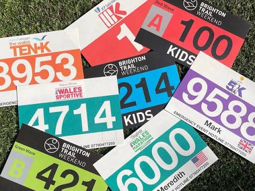 Custom numbered race bibs with event and wave colors